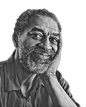 elderly man smiling with hand on cheek