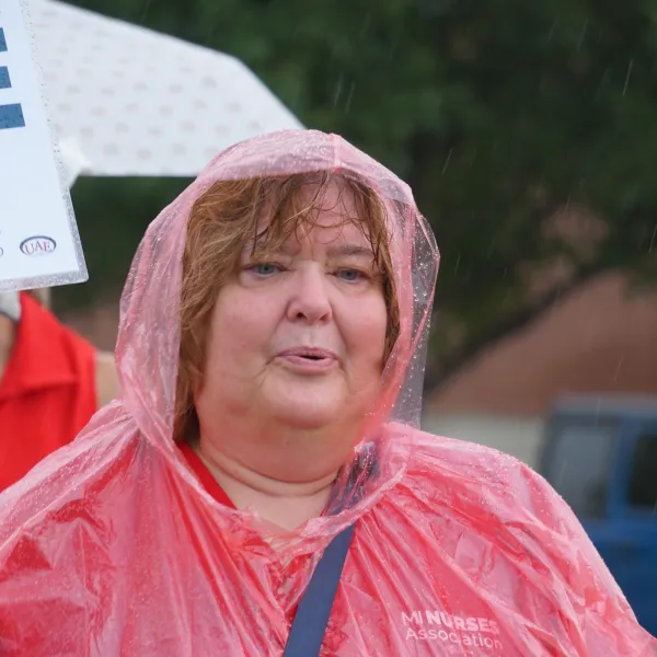 MNA Alma member in rain on strike